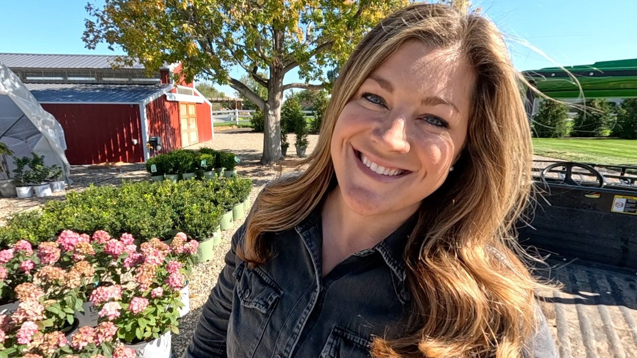 laura smiling outside the ranch