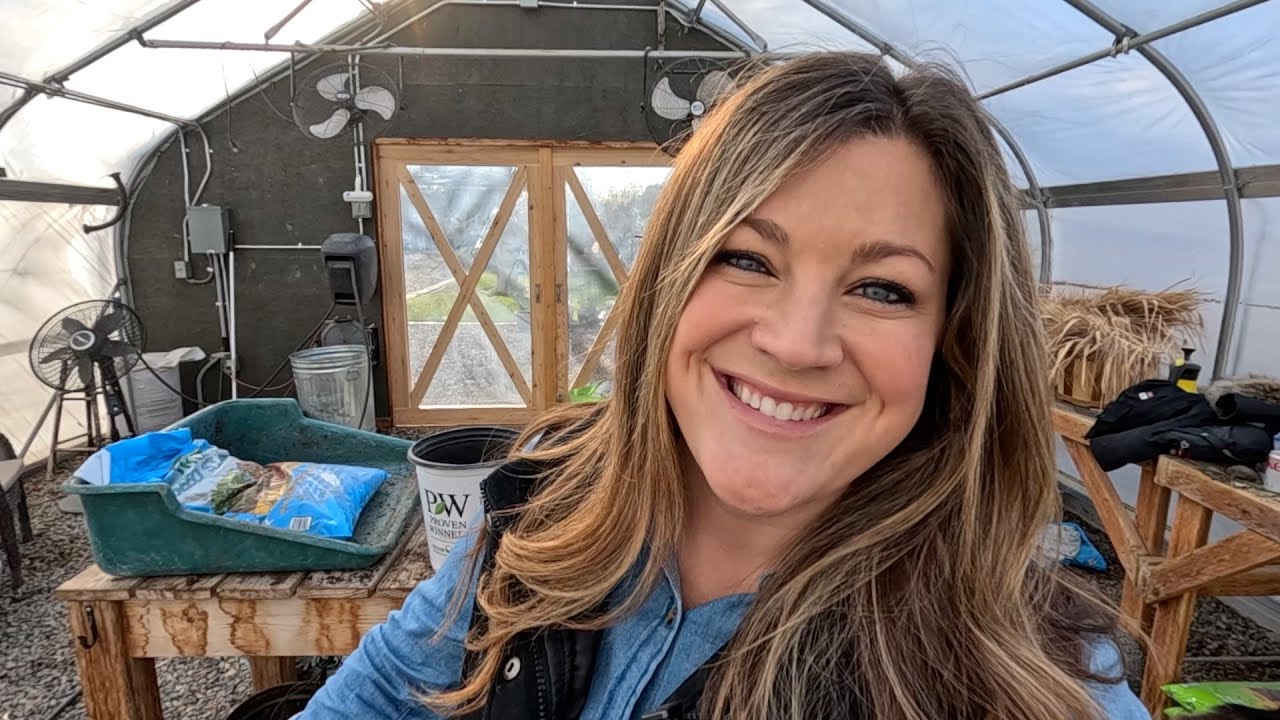 laura smiling in her garden house