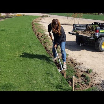 Edging the Grass Pathway to the Cut Flower Garden!
