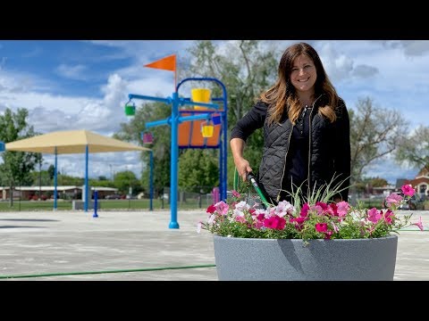 Planting Self-Watering Containers at Our City's New Splash Pad!