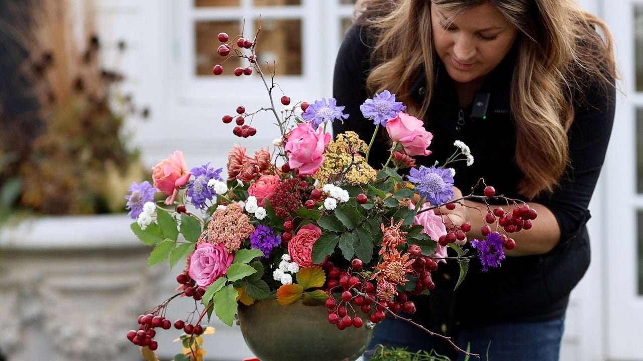 Laura fixing a flower arrangement