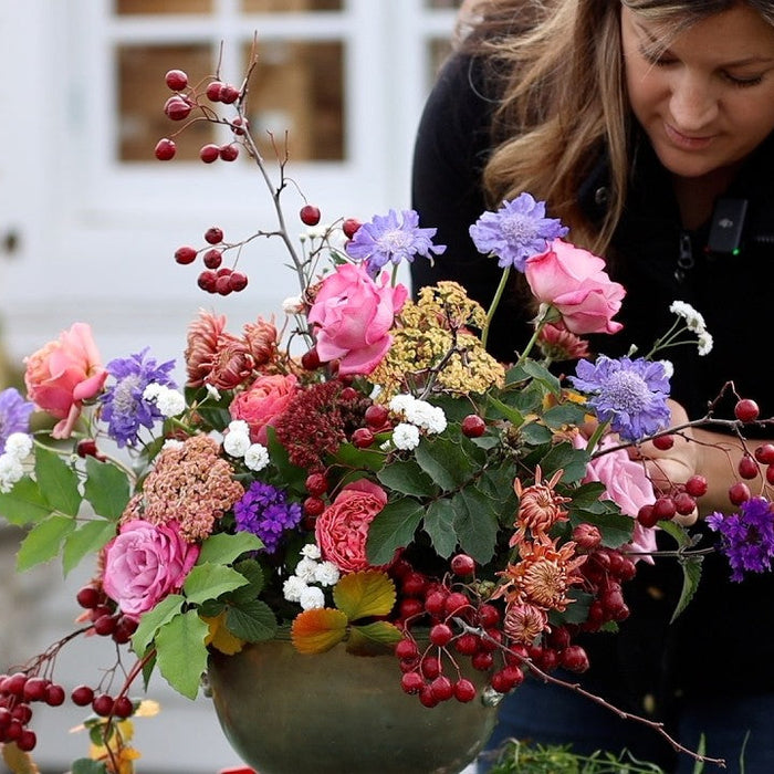 Laura fixing a flower arrangement