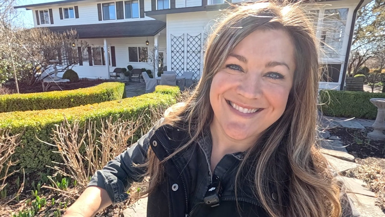 Laura happy at her porch