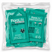 A clear resealable bag contains multiple green packets from the FloraLife Flower Food (Pack of 10), each labeled for use in 0.5 L of water. This vase water conditioner features floral illustrations and instructions in English, French, and Spanish to help extend flower life effortlessly.