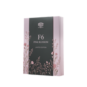 A rectangular product box for the FELCO 6 Pink Blossom (Limited Edition), decorated with pink floral illustrations and featuring a black center panel labeled F6 PINK BLOSSOM LIMITED EDITION.