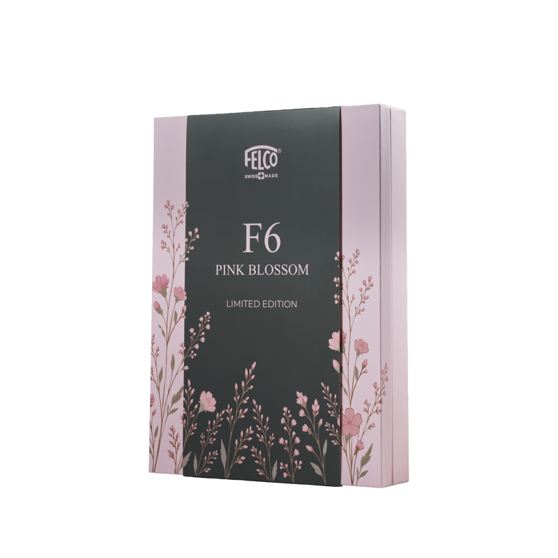 A rectangular product box for the FELCO 6 Pink Blossom (Limited Edition), decorated with pink floral illustrations and featuring a black center panel labeled F6 PINK BLOSSOM LIMITED EDITION.