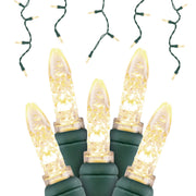 LED Icicle String Lights (Green Wire) featuring five warm white lights with textured lenses and several short hanging strands.